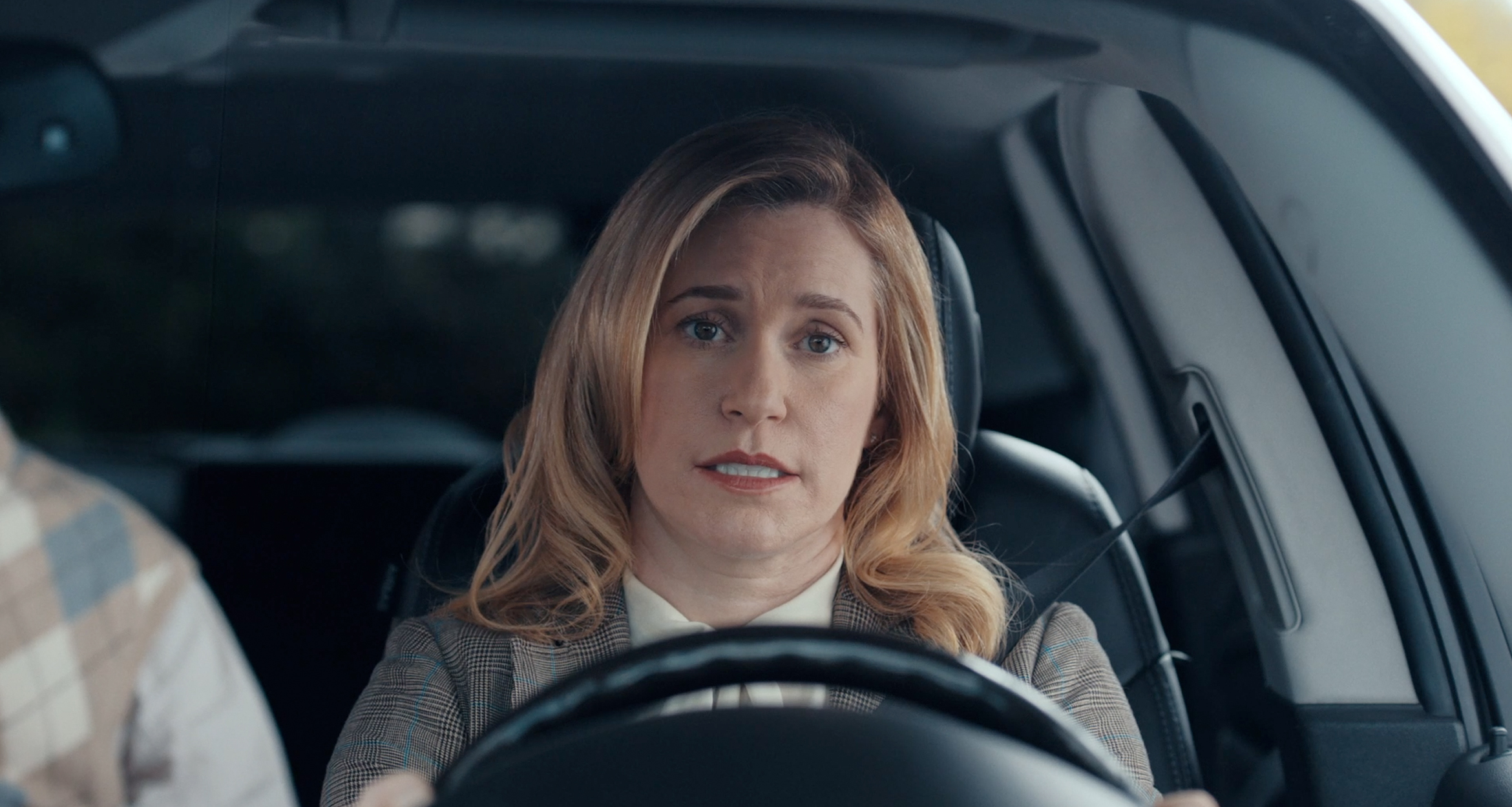 Woman driving in GM Certified Story Time video: The Commuters, Vehicle Inspection 