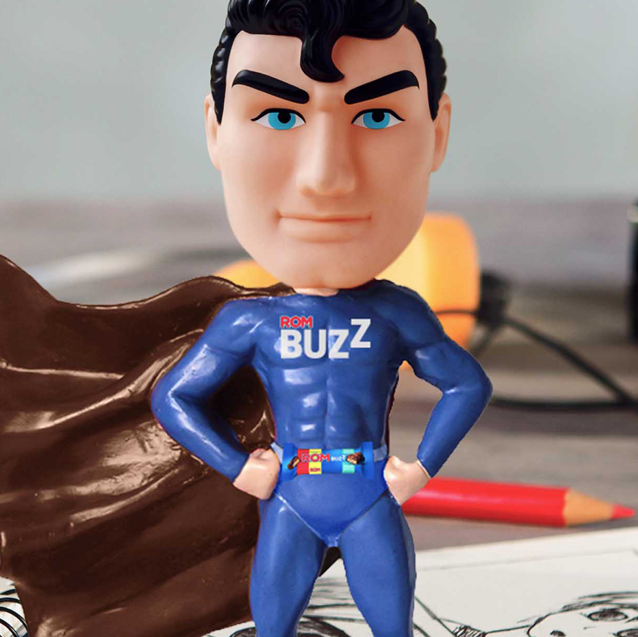 ROM Buzz Man superhero bobblehead figure