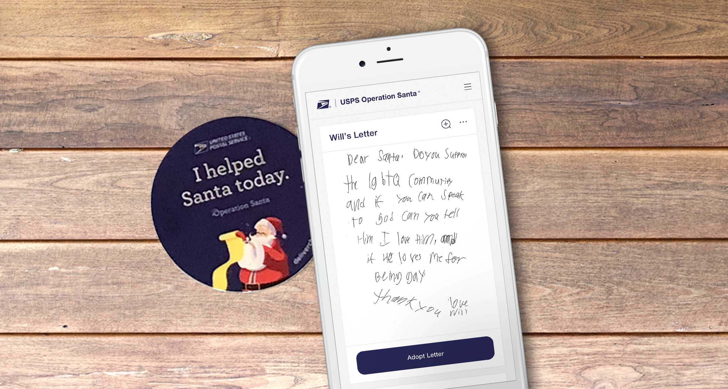 Handwriten letter to Santa on mobile phone: I helped Santa today 